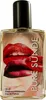 A bottle of perfume with a label featuring red lips. Produktbild-Vorschau