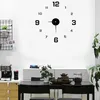 A modern living room with a wall clock, furniture, and plants. Podgląd zdjęcia produktu