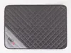 A flat lay image of a quilted dog mat on a white background. Voir les images du produit