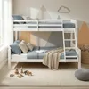 A bedroom scene with a bunk bed, bedding, pillows, and toys. Náhľad obrázku produktu