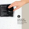 A hand is shown adjusting a control knob on a black panel, which is part of a larger product. Text overlays describe features. Produktbild-Vorschau