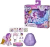 A product shot of a My Little Pony toy set, including the packaging and loose accessories. Náhľad obrázku produktu