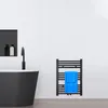 A modern bathroom with a black bathtub, a black faucet, and a black towel warmer with blue towels. Produktbild-Vorschau