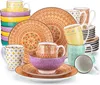 A collection of ceramic dinnerware and mugs with a bohemian-inspired pattern. Náhled obrázku produktu