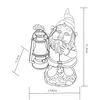 A line drawing of a garden gnome holding a lantern, with dimensions indicated by lines and text. Produktbild-Vorschau