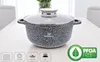 A speckled gray pot with a glass lid sits on a light-colored table, with icons indicating compatibility with various stovetops and a PFOA-free certification badge. Produktbild-Vorschau