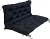 A black tufted cushion for a chair or bench, shown from a diagonal angle against a white background.