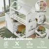 A white bunk bed with a house-shaped frame, shown in a room with a large window and a leaf-shaped rug. Anteprima dell’immagine prodotto