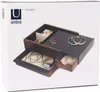 The image shows the packaging of a jewelry box, with a clear view of the product inside. Voir les images du produit