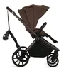 A side view of a brown and black stroller, isolated on a white background. Náhľad obrázku produktu