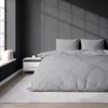 A bedroom scene with a bed, nightstand, and window. Produktbild-Vorschau