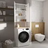 A laundry room with a washing machine, a cabinet above it, and a toilet. Anteprima dell’immagine prodotto