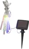A string of solar-powered LED lights with icicle-shaped bulbs and a solar panel stake. Produktbild-Vorschau