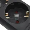 A close-up view of a black power strip with multiple sockets and gold-colored electrical contacts. Produktbild-Vorschau