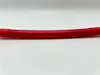A close-up shot of a red cable on a white background. Produktbild-Vorschau