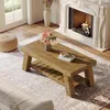 A living room scene with a coffee table, fireplace, and seating area. Anteprima dell’immagine prodotto