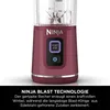 A close-up of a red Ninja blender with its controls and branding visible, set against a white background. Podgląd zdjęcia produktu