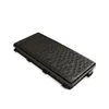 A black rectangular object with a honeycomb pattern on top, presented in a studio setting against a white background. Produktbild-Vorschau
