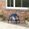 A white dog sits on a raised dog bed with a blue canopy on a patio. Anteprima dell’immagine prodotto