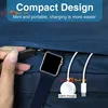 A hand is shown zipping up a navy blue bag, revealing a smartwatch and its charging accessories inside. Produktbild-Vorschau