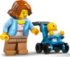 A LEGO mother pushing a baby in a stroller. Produktbild-Vorschau