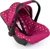 A pink polka dot doll car seat with a canopy and handle. Náhled obrázku produktu