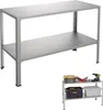 A two-tiered metal shelving unit, shown from a slightly elevated front-left angle, against a white background. A smaller, similar shelving unit with tools and storage boxes is visible in the bottom right corner. Voir les images du produit