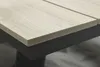 Close-up of a table edge, showing the wood grain and the dark frame. Produktbild-Vorschau