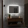 A modern bathroom vanity with a backlit mirror, sink, and accessories. Produktbild-Vorschau