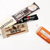 Several coffee and cookie sample packets are arranged on a white background. Produktbild-Vorschau