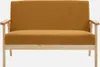 A front view of a mustard yellow sofa with wooden legs. Anteprima dell’immagine prodotto