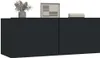 A black sideboard with decorative items on top. Produktbild-Vorschau