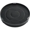 A round charcoal filter with a dark grey plastic casing sits on a black background. The filter has concentric circles of varying thickness, suggesting a carbon filter material within. Anteprima dell’immagine prodotto
