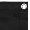 A close-up view of a black fabric material with a metal grommet in the top right corner. Náhľad obrázku produktu