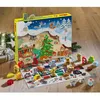 A HABA advent calendar with small wooden figures and dice laid out on a wooden surface. Anteprima dell’immagine prodotto