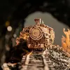 A wooden model train on a miniature railway track. Náhľad obrázku produktu