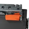 A close-up view of a drawer slide mechanism, featuring an orange release lever. Voir les images du produit