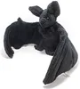 A black plush bat toy is displayed against a white background. Voir les images du produit
