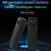 Two black portable cameras are displayed against a dark, gradient background with blue lighting effects. Náhled obrázku produktu
