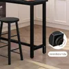 A close-up view of the leg of a black bar table and a black bar stool, with a detail inset showing an adjustable foot. Náhľad obrázku produktu