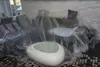 Furniture covered in plastic sheeting in a room. Produktbild-Vorschau