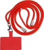 A red lanyard with a phone holder attachment. Podgląd zdjęcia produktu