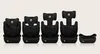 Five black car seats of varying heights are displayed in a row against a light beige background. Náhled obrázku produktu