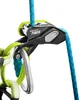 Close-up of a climbing safety device attached to a harness with ropes. Náhľad obrázku produktu
