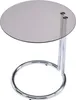 A round side table with a glass top and a chrome base. Anteprima dell’immagine prodotto