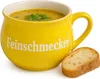 A yellow soup mug with text and a slice of bread. Voir les images du produit