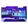 A gaming setup with two monitors displaying a video game, a microphone, and a keyboard. Produktbild-Vorschau