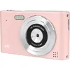 A pink digital camera with a silver lens is shown against a white background. Produktbild-Vorschau
