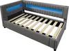 A grey upholstered bed frame with wooden slats and blue LED lighting, shown from a diagonal angle. Anteprima dell’immagine prodotto