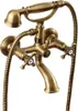 A close-up studio shot of a vintage-style bathtub faucet with a handheld showerhead. Náhľad obrázku produktu